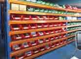 integrated storage system for long-length and standard carton/parts storage.