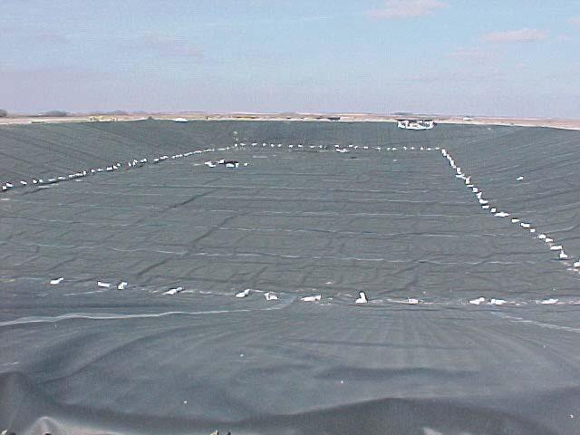 1.3. Definitions Synthetic liners are very low permeability manmade membranes or barriers used to control fluid migration in an earthen manure storage structure.