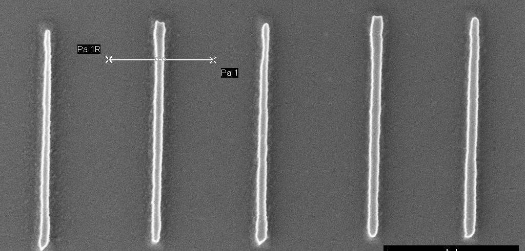 30nm Figure 9.6. Close-up view of voltage lithography results from the 7 V region of Figure 9.5. Lines as thin as 30 nm have been written with nanoneedles (Voltage lithography performed by A. Safir).