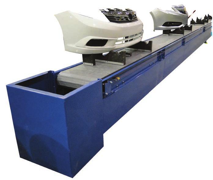 PLASTIC BELT BUMPER CONVEYOR NO: 515 THE APPLICATION: Bumper Assembly Line THE PRODUCT: Plastic Belt Conveyor THE INDUSTRY: Automotive Manufacturing THE NEED: An