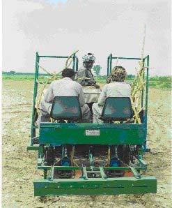 of labours employed 5 Seed dropped/ha 5.55 t/ha. Speed of operation 1.85 km./hr. 6.1 Field Evaluation Photographs Fig.4. Sugarcane Cutter Planter without Leveler 7. CONCLUSIONS Fig.5. Sugarcane Cutter Planter with Leveler The field capacity of the machine was 0.