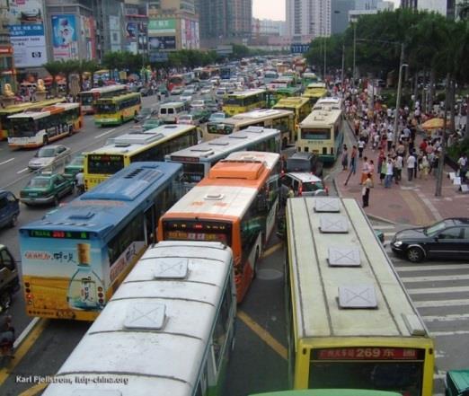 occupying the center of the roadway Stations that are level to bus