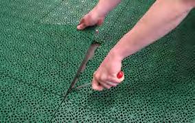 EASY TO INSTALL AND MOVE Tapping a rubber mallet or similar over the protruding rings easily interlocks the tiles together. No special tools, glue or screws are required.