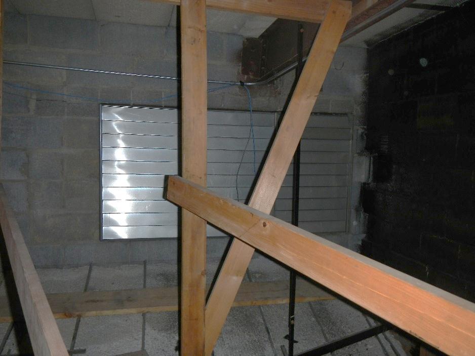 Auditorium Existing Conditions The top of the shaft near the stage in the ceiling plenum has a gravity