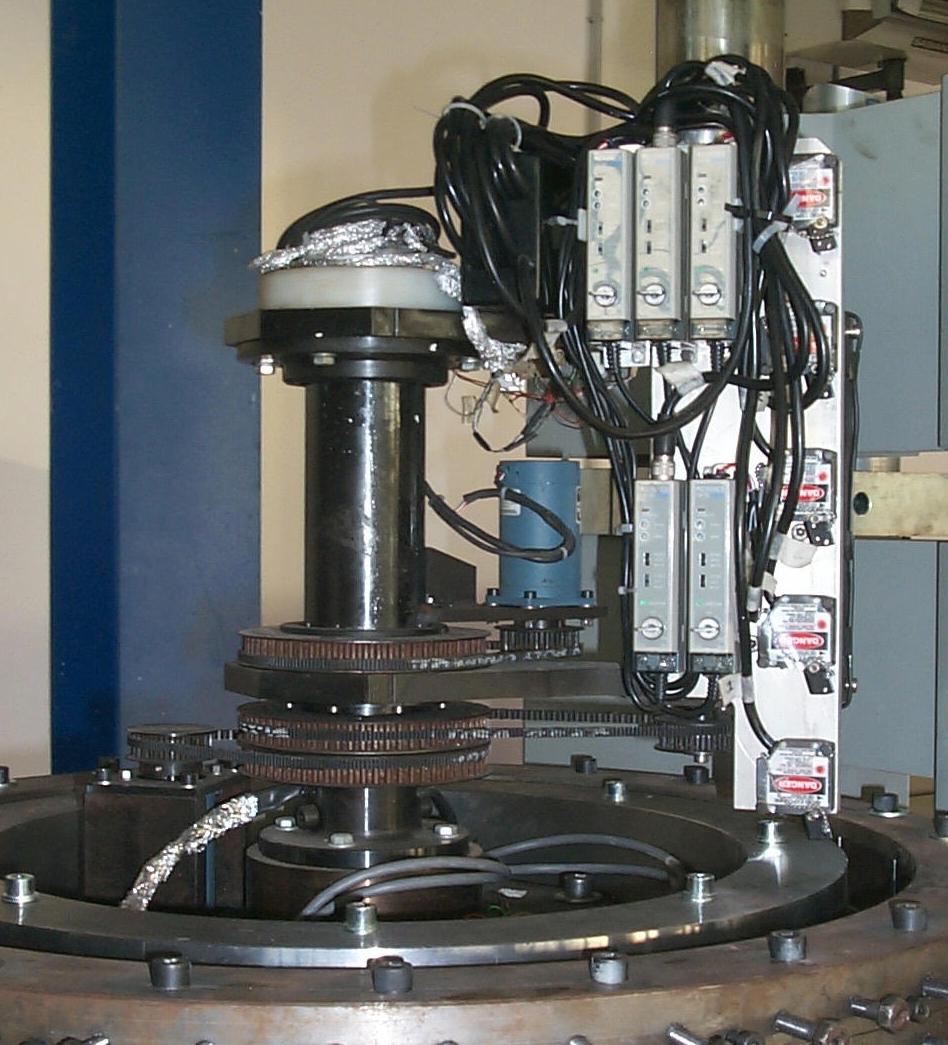The compression load is measured, during the tests, by means of a load cell situated under the lower clamp, while three LVDT transducers measure the axial displacement of the specimen in three