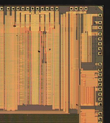The key characteristics of the die are: size - 6.469 mm x 5.902 mm, thickness - 75 μm, pad pitch 65 μm, and Cu bump thickness - 20 μm. The top right corner of Intel test die is shown in Figure 8.