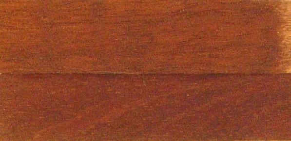 Addition of a light coat of Red-Oak stain over the base stain of walnut brings the new veneer tone into a match with that of the old veneer.