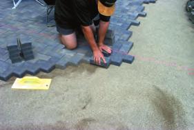 Laying Pavers Once you have selected a laying pattern, start placing the pavers from a corner or along a straight edge or