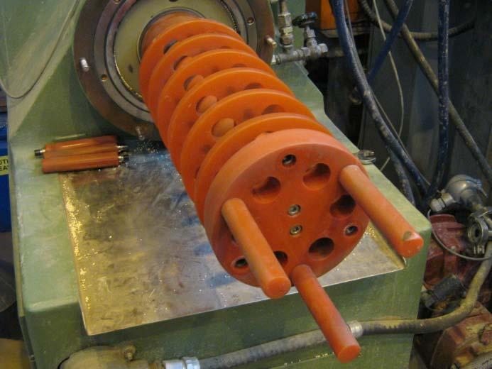 Since coarse particles may have trouble passing through the dynamic classifier and exiting the mill, a test was conducted to assess whether removal of dynamic classifying pegs (refer to Figure 4-18)