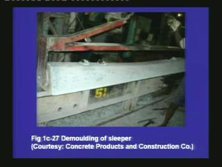 (Refer Slide Time: 53:52) In this photograph, we can see that a sleeper is being taken out from the mould.