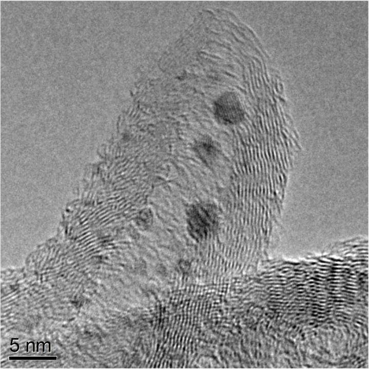 8 Figure 3: TEM Image of Rh/CNT sample at 300Kx, numerous Rh particles are