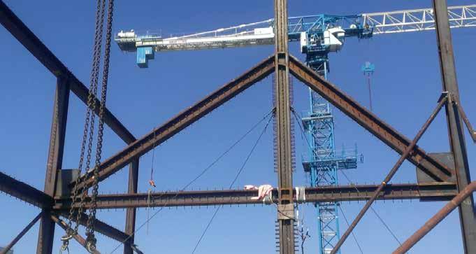 Due to the location of the steel trusses used to support the shear wall (90 ft long and 18 ft high) from level 21 (elevation 259 ft) to level 23