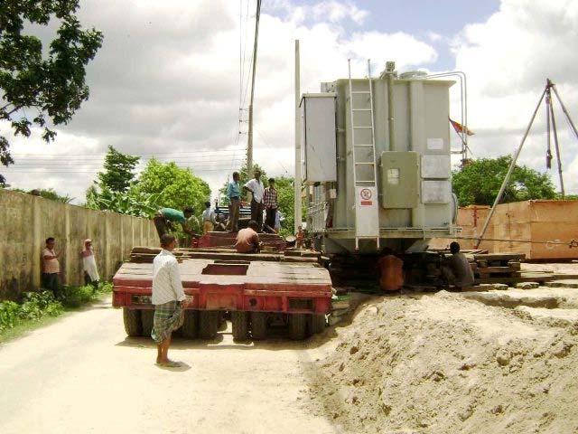 vi. The Transformer moved from the trailer on to the raised ground by using steel rollers and wire tackle. 2.
