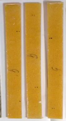 Commercially available adhesive named Araldite was used to fix the tabs to the test specimens.