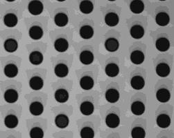 First, a chrome-on-quartz mask is placed directly onto the glass wafer, without photoresist, and exposed using a 310nm light source (Figure 1A).