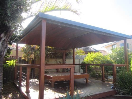 Mindarie REAR FREESTANDING PATIO a) The roofed Patio