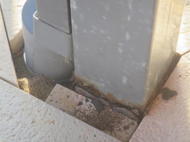 c) The metal posts have rusted severely at the base causing a weakness and in the opinion of the inspector is