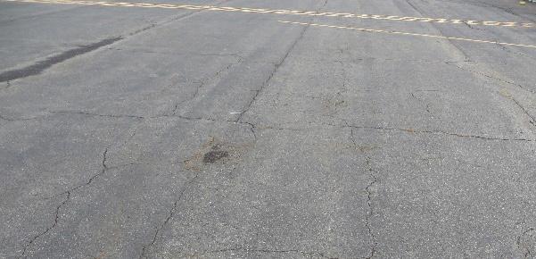 ALLIGATOR CRACKING Alligator cracking is a load-related distress caused by excessive tensile strains at the bottom of the asphalt (AC) layer or stabilized asphalt base layer from