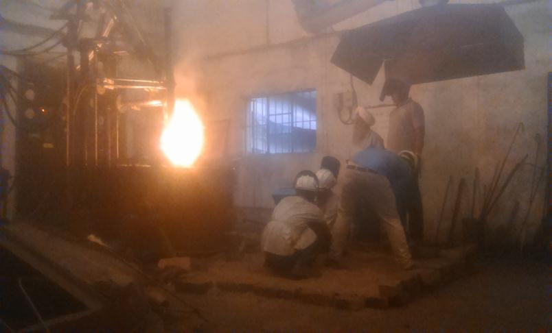 After completion of smelting of reduction of the charge, tape hole of the furnace was open with the help of oxygen lancing and metal were poured on the sand mould.