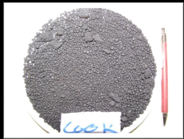 Based on fuel analyses it can be expected that asphaltene is much reactive (shorter combustion time) than petcoke and achieving of low SO 2 and NO emissions would be challenging for both the fuels.