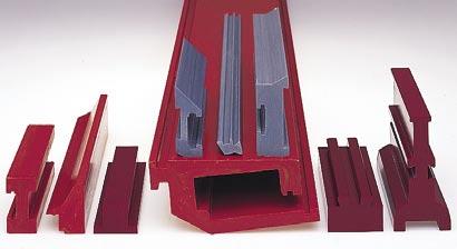 profiles (20" wide x 5" high) form structural covers for wastewater treatment cells.