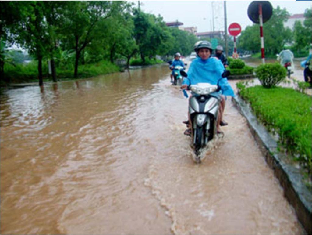 (local) flood due to heavy rain and blocked drainage system -