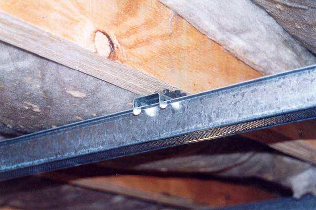 Floor 2; Close up of floor joist with RSIC