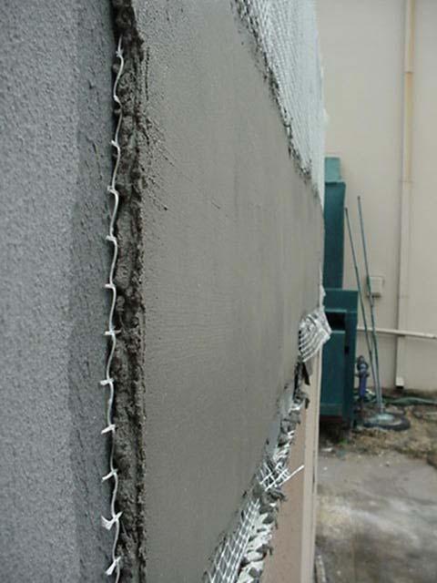 Typical Installation 1) Stucco wall is first covered with asphalt roofing paper. The lath is cut with a utility knife. 2) The mesh is stapled to the wall with a pneumatic stapler (Fig. 8.33).