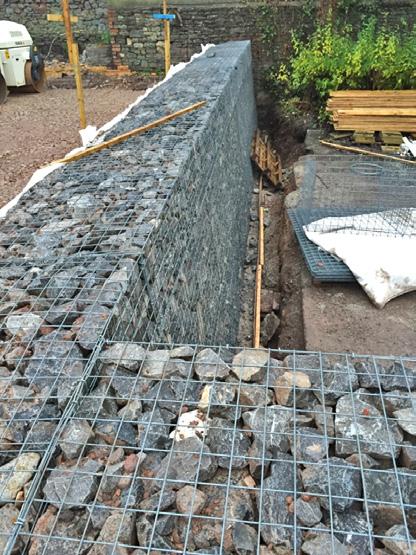 6 Gabion fill (Class 6G) Class 6N granular backfill to be suitably rolled and compacted in layers not exceeding 300mm in coordination with the gabion stone rock fill EMGEO-L200 Geotextile membrane