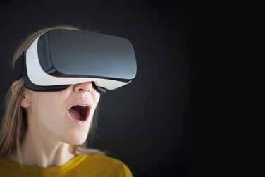 HOLIDAY SELF-MAILER WITH MOBILE WALLET COUPON A consumer electronics retailer wants to pull people in with a limited-time holiday promotion for customers buying a virtual reality