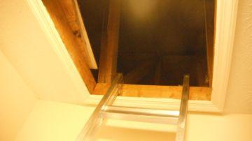 Access Attic Scuttle Hole located in: Bedroom Closet. IMPROVE: The attic access is not insulated. Expect some energy loss through convection.
