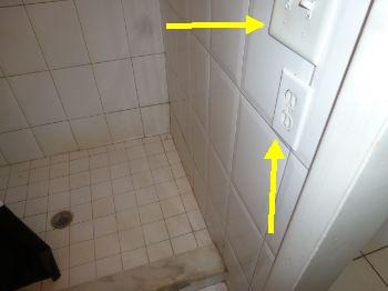 Recommend relocating outlet at full bath. Outlet and switch is within 3 inches of wet area.