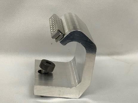 This holder can accommodate wire specimens for cutting a flat surface for FIB mounting.