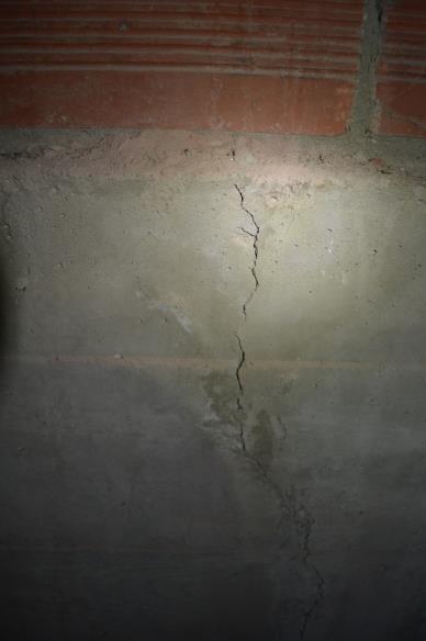 beams being wider at the top and narrow at the bottom and some of the cracks were consistent top to bottom.