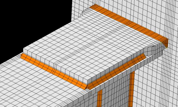 The size of the finite-element mesh varied over the length and height of the model. A finemesh was used near the connection of the beam to the column and the beam flange to the reinforcing plate.