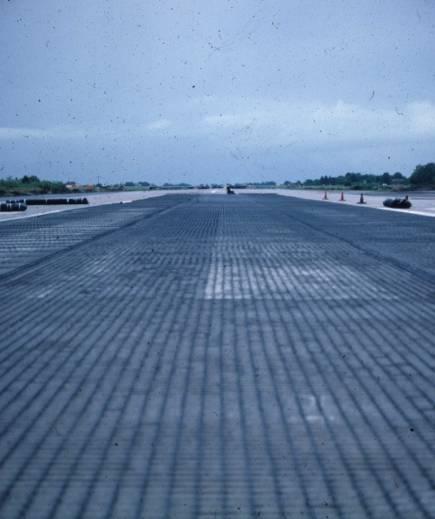 1988, Asphalt Reinforcement, Don Muang Airport, Bangkok, Thailand AR1 reinforcing grid was used when overlaying aging concrete slabs in need of repair around the aircraft gates.