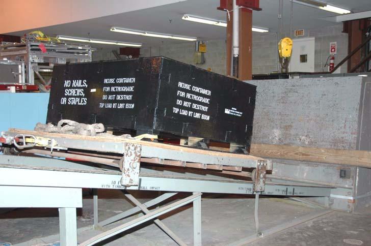TEST PROCEDURES AND RESULTS Figure 8. Incline Impact Test (With Timber) NOTE: During the drop and impact tests, some minor shifting of the side panels was observed.