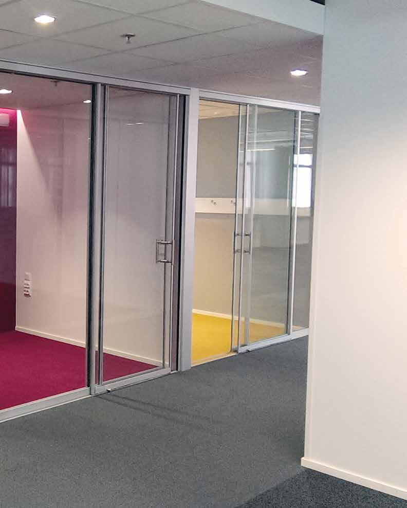 Double-structured glass wall with sliding door. Sound insulation 40 db Rw.