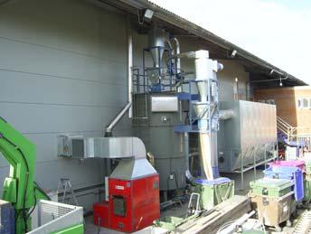employs a 15,000 litre rain harvester which feeds jet washers, showers and toilets; energy considerate employs a wood burner heats 80% of warehouse (recovering site waste wood); and materials