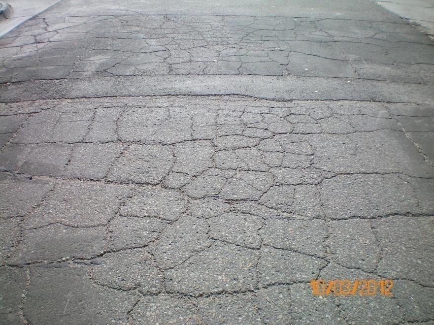 RATING 2. POOR- Roads are severely deteriorated and need reconstruction.