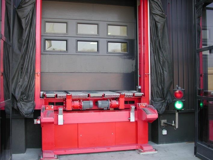 The driver reverses the trailer onto a leveller roller assembly, this ensures that the floor of the trailer matches the level of the fixed Moveco Systems dock in the warehouse, irrelevant to the
