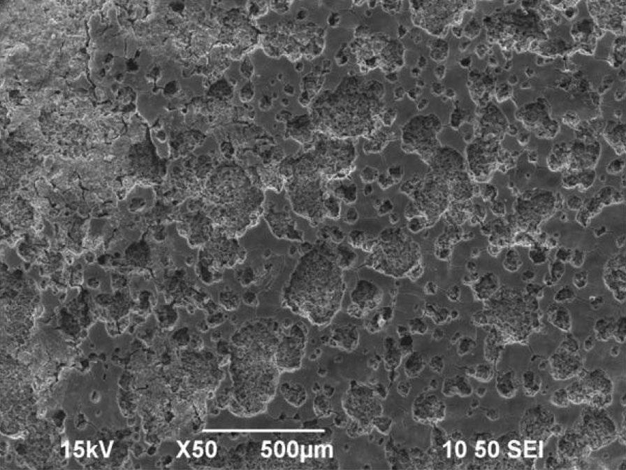 (a) (b) (c) FIGURE 5. SEM images of the corroded surface of the samples exposed to 25 wt% NaCl solution at 65 C: (a) 4 MPa, (b) 8 MPa, and (c) 12 MPa.