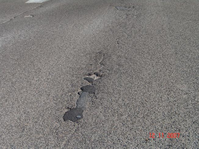 condition of asphalt surface, age 15+ years Surface ravelling evident from 5 to 6 years Pavement Life Cycle