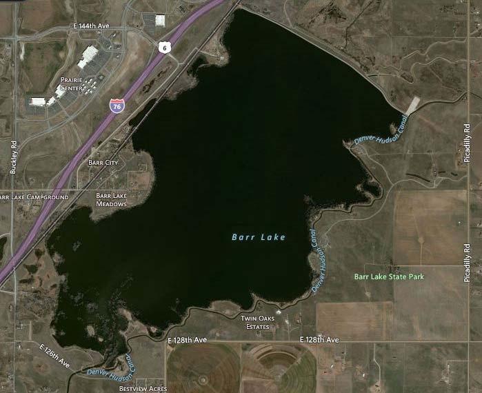 4-21 Floc deposited into shoreline and deep areas of the lake Figure 4-10. Floc Discharging into Barr Lake During High Water Conditions.