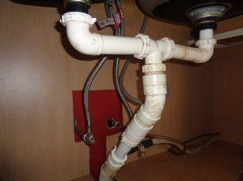 1. Plumbing Plumbing Improper "S" trap noted at the bathroom sink. This trap configuration may cause the trap to siphon dry, allowing sewer gas and odor to enter the dwelling.