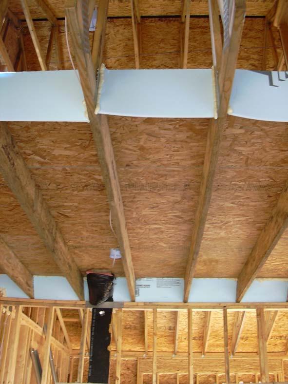 Insulated floor above garage air
