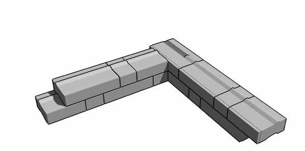 Remove 12"(30cm) of the tongue with a masonry chisel and position the block edge 6"(15cm) from the face of the adjacent block. Place standard Blocks to complete the course.