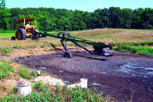 Over time, moisture leaches from the tube until the solids are dry enough to handle with a manure spreader. At that time, the tube is cut open and the solids land applied.