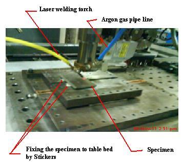 Fig: 4.9 Experiment set up for Laser welding Fig: 4.10 Square butt joint Laser welds were carried out at four different laser welding speeds (1.0 m/min, 1.5 m/min, 2.0 m/min and 2.5 m/min).