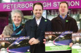 Rupert Read (centre), European election candidate for Eastern England, campaigns for the re-nationalisation of the railways.